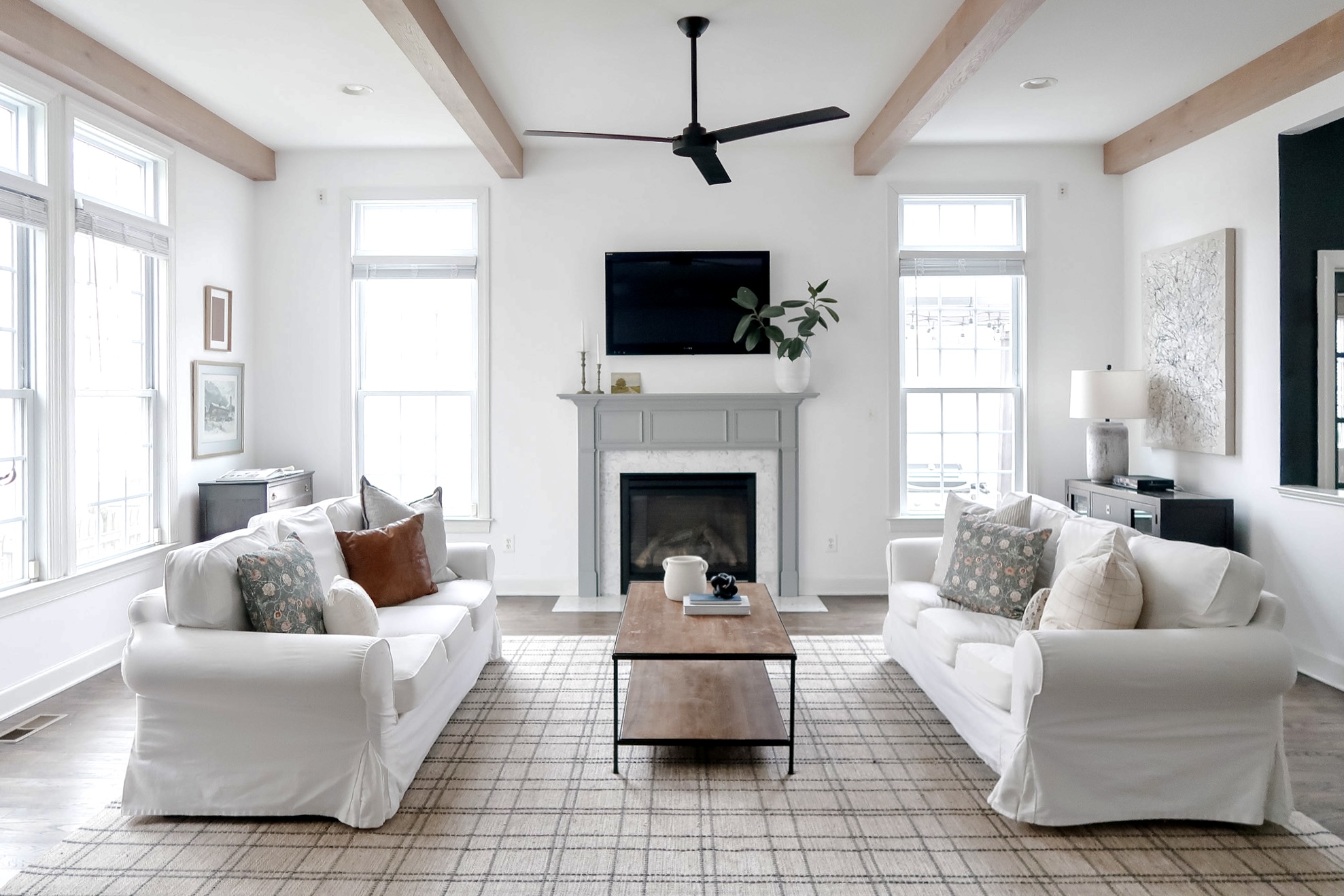 living room with ceiling beams